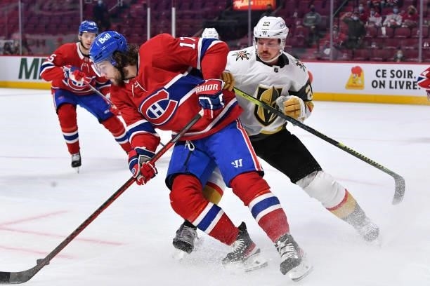 June 18: Josh Anderson of the Montreal Canadiens skates with the puck under pressure from Nick Holden of the Vegas Golden Knights in Game Three of...