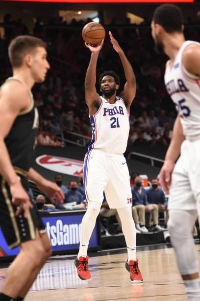 Joel Embiid of the Philadelphia 76ers shoots a three-pointer against the Atlanta Hawks during Round 2, Game 6 of the Eastern Conference Playoffs on...