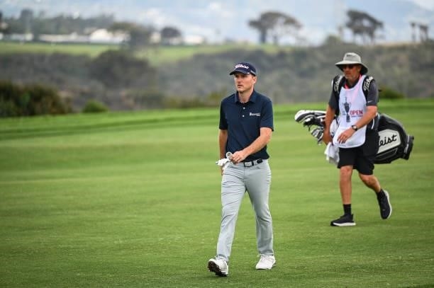 Russell Henley walks on the sixth hole fairway during the second round of the 121st U.S. Open on the South Course at Torrey Pines Golf Course on June...