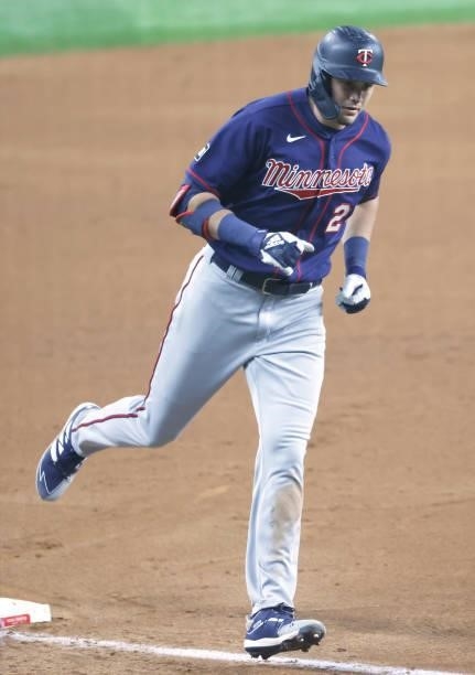 Trevor Larnach of the Minnesota Twins runs the bases after hitting a solo home run against the Texas Rangers during the fifth inning at Globe Life...