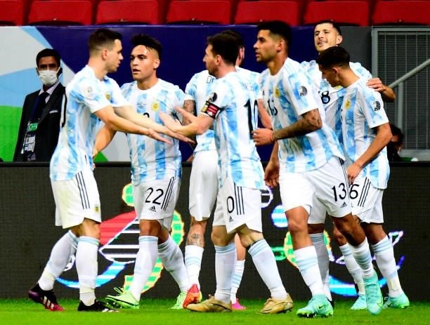 Guido Rodriguez of Argentina celebrates with his teammates after scores a goal during the match between Argentina and Uruguay as part of Conmebol...