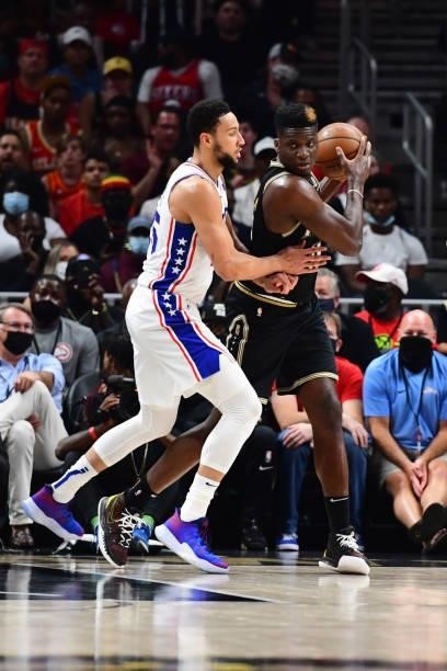 Clint Capela of the Atlanta Hawks looks to pass the ball against the Philadelphia 76ers during Round 2, Game 6 of the Eastern Conference Playoffs on...