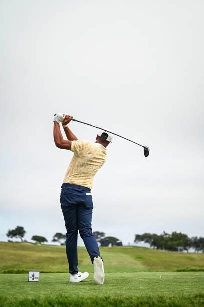 Tony Finau follows through as he plays his shot from the second tee during the second round of the 121st U.S. Open on the South Course at Torrey...