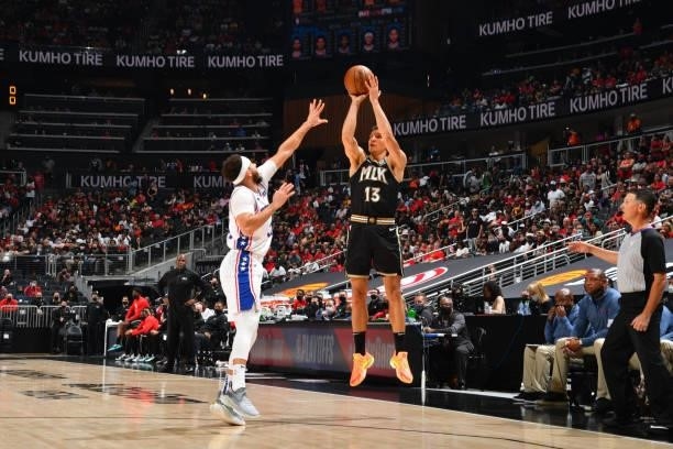 Bogdan Bogdanovic of the Atlanta Hawks shoots a three-pointer against the Philadelphia 76ers during Round 2, Game 6 of the Eastern Conference...