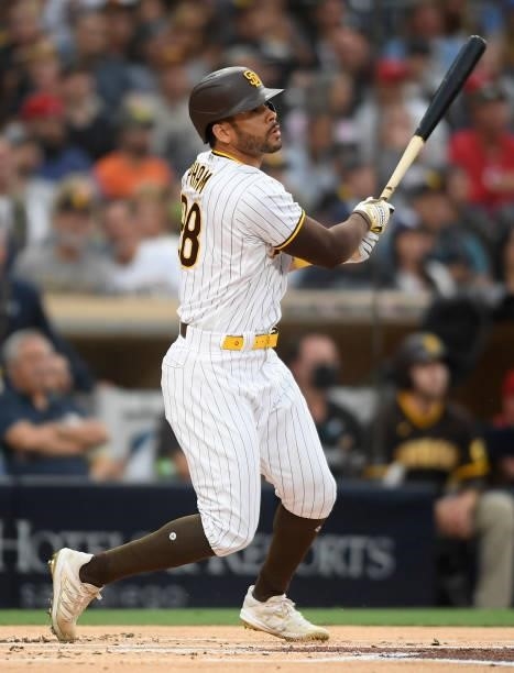 Tommy Pham of the San Diego Padres hits a solo home run during the first inning of a baseball game against the Cincinnati Reds at Petco Park on June...