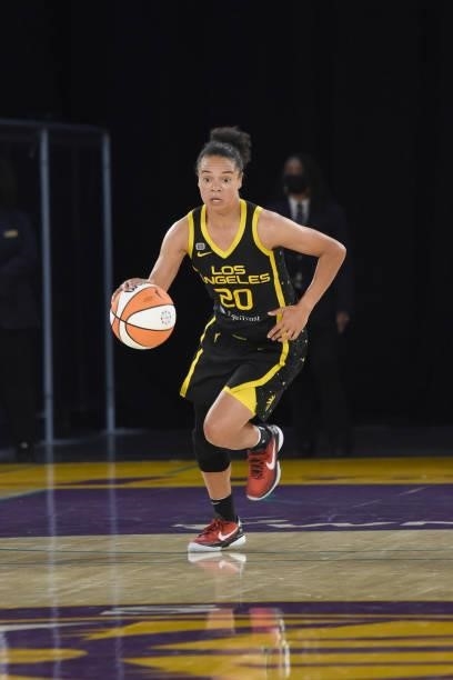 Kristi Toliver of the Los Angeles Sparks dribbles the ball against the Phoenix Mercury on June 18, 2021 at the Los Angeles Convention Center in Los...