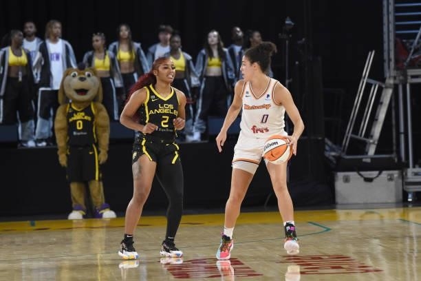 Te'a Cooper of the Los Angeles Sparks plays defense on Kia Nurse of the Phoenix Mercury on June 18, 2021 at the Los Angeles Convention Center in Los...