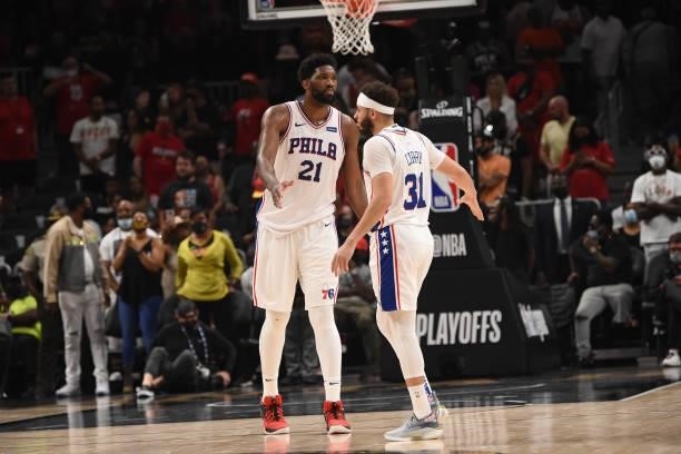 Joel Embiid of the Philadelphia 76ers and Seth Curry of the Philadelphia 76ers high-five after a game against the Atlanta Hawks during Round 2, Game...