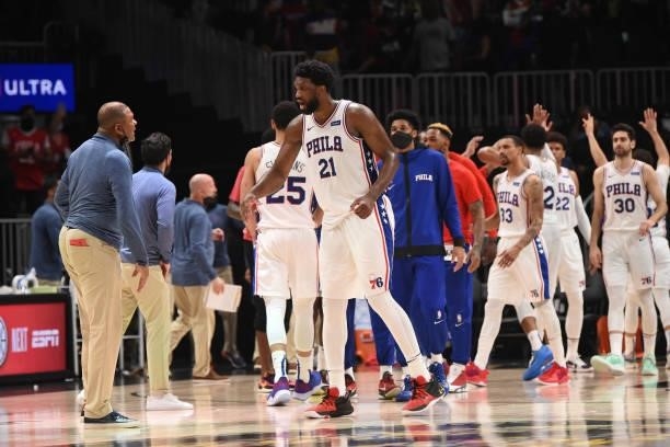 Head Coach Doc Rivers and Joel Embiid of the Philadelphia 76ers high-five after a game during Round 2, Game 6 of the Eastern Conference Playoffs on...