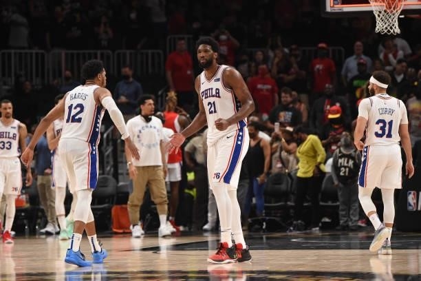 Tobias Harris of the Philadelphia 76ers and Joel Embiid of the Philadelphia 76ers react after a game against the Atlanta Hawks during Round 2, Game 6...