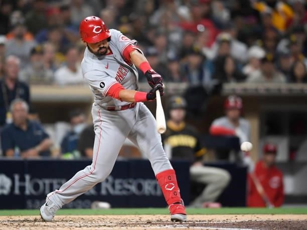 Eugenio Suarez of the Cincinnati Reds hits a single during the fourth inning of a baseball game against the San Diego Padres at Petco Park on June...