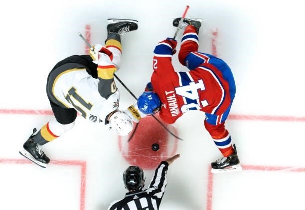 June 18: Phillip Danault of the Montreal Canadiens faces off against Nicolas Roy of the Vegas Golden Knights in Game Three of the Stanley Cup...
