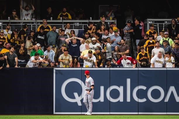 Fans react after Jesse Winker of the Cincinnati Reds made a leap catch at the wall in the fifth inning against the San Diego Padres on June 18, 2021...