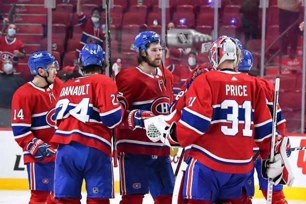 June 18: Carey Price of the Montreal Canadiens celebrates with teammates after defeating the Vegas Golden Knights in Game Three of the Stanley Cup...