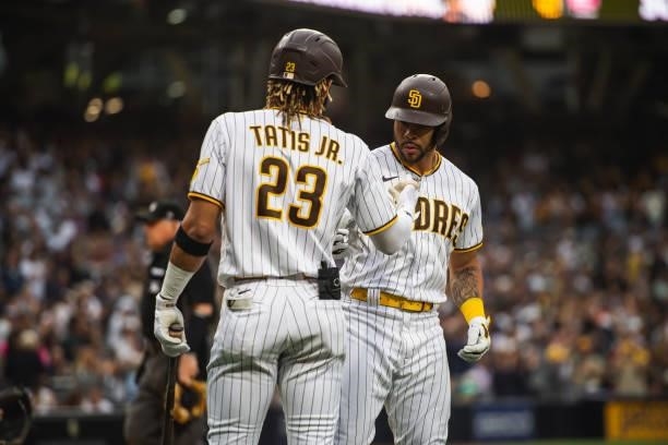 Tommy Pham celebrates with Fernando Tatis Jr of the San Diego Padres after hitting a home run in the first inning against the Cincinnati Reds on June...