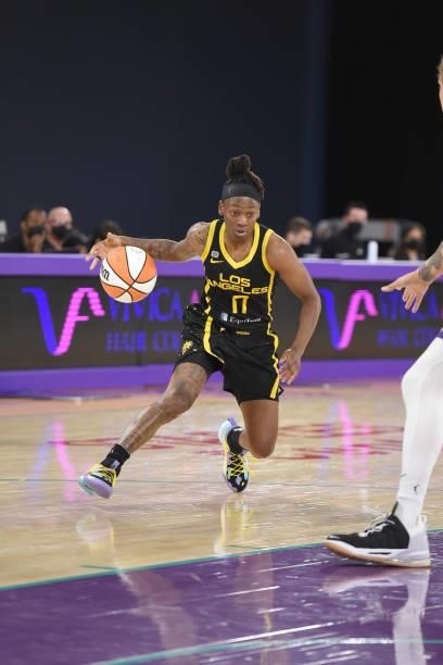 Erica Wheeler of the Los Angeles Sparks dribbles the ball against the Phoenix Mercury on June 18, 2021 at the Los Angeles Convention Center in Los...