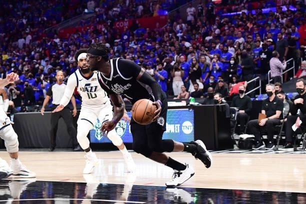 Reggie Jackson of the LA Clippers handles the ball during the game against the Utah Jazz during Round 2, Game 6 of the 2021 NBA Playoffs on June 18,...