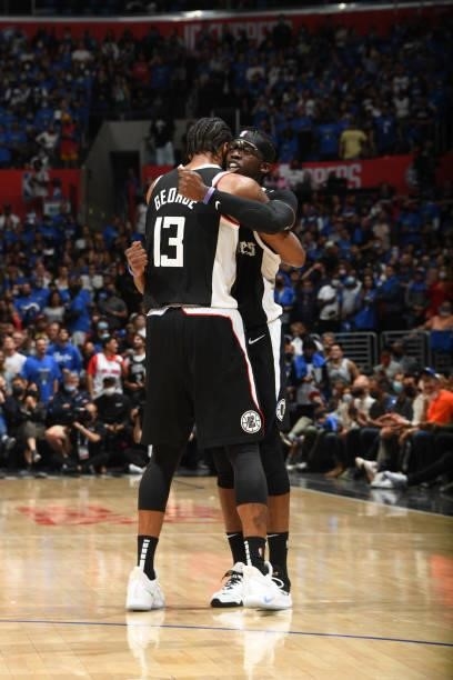 Paul George of the LA Clippers hugs teammate Reggie Jackson during the game against the Utah Jazz during Round 2, Game 6 of the 2021 NBA Playoffs on...