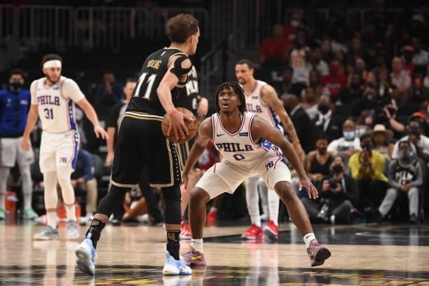 Tyrese Maxey of the Philadelphia 76ers plays defense against Trae Young of the Atlanta Hawks during Round 2, Game 6 of the Eastern Conference...