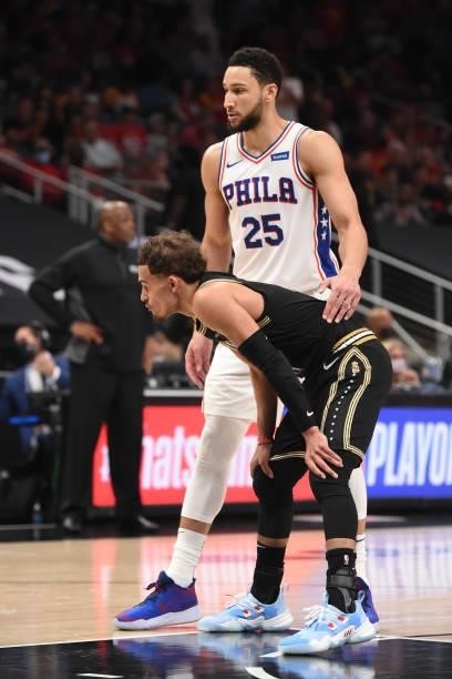 Ben Simmons of the Philadelphia 76ers and Trae Young of the Atlanta Hawks look on during Round 2, Game 6 of the Eastern Conference Playoffs on June...