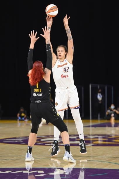 Brittney Griner of the Phoenix Mercury shoots the ball over Amanda Zahui B of the Los Angeles Sparks on June 18, 2021 at the Los Angeles Convention...