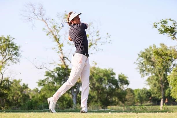 James Nicholas plays his shot from the 17th tee during the second round of the Wichita Open Benefitting KU Wichita Pediatrics at Crestview Country...