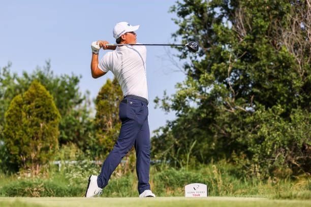 Xinjun Zhang plays his shot from the 18th tee during the second round of the Wichita Open Benefitting KU Wichita Pediatrics at Crestview Country Club...
