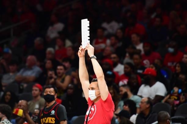 An Atlanta Hawks fan holds up an ice cube tray during the game against the Philadelphia 76ers during Round 2, Game 6 of the Eastern Conference...