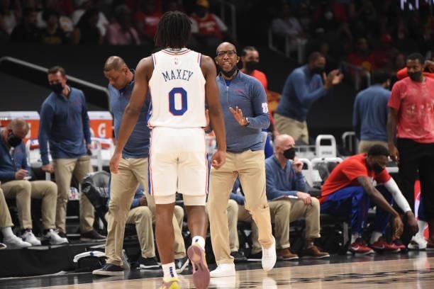 Tyrese Maxey of the Philadelphia 76ers and Assistant Coach Sam Cassell talk during a game against the Atlanta Hawks during Round 2, Game 6 of the...