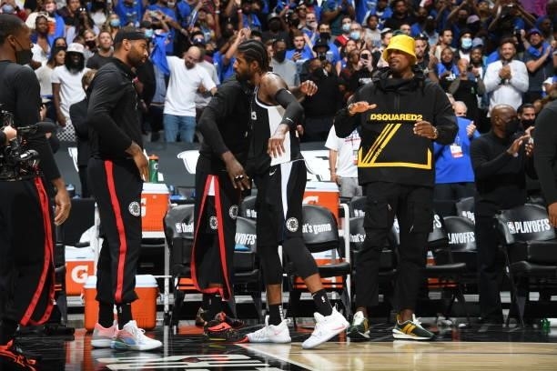 Paul George of the LA Clippers high-fives teammates during the game against the Utah Jazz during Round 2, Game 6 of the 2021 NBA Playoffs on June 18,...