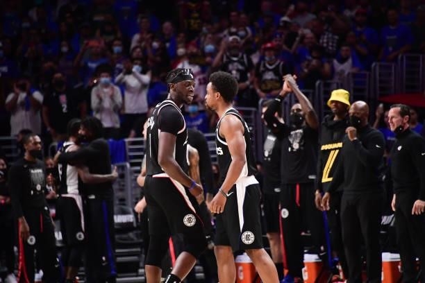 Reggie Jackson of the LA Clippers talks to Yogi Ferrell of the LA Clippers during the game against the Utah Jazz during Round 2, Game 6 of the 2021...