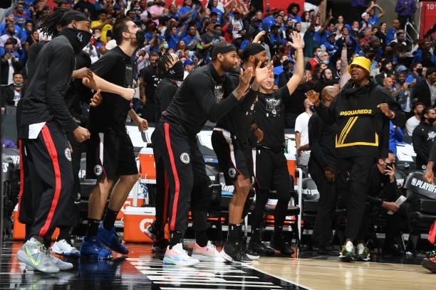 The LA Clippers bench celebrates during the game against the Utah Jazz during Round 2, Game 6 of the 2021 NBA Playoffs on June 18, 2021 at STAPLES...