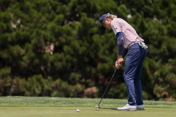 Max Rottluff putts on the 18th green during the second round of the Wichita Open Benefitting KU Wichita Pediatrics at Crestview Country Club on June...