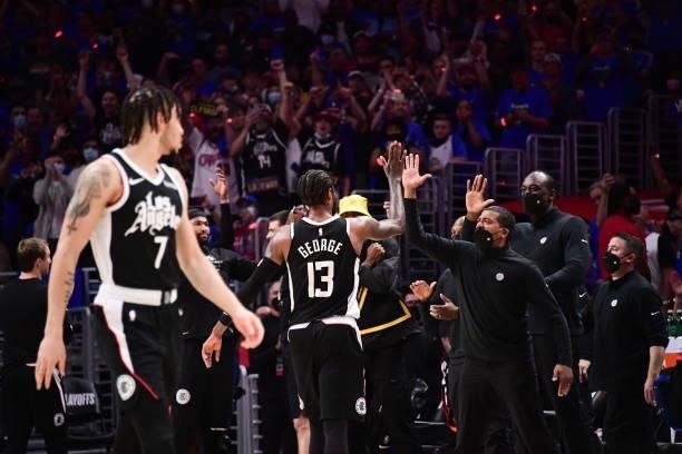 Paul George of the LA Clippers high fives a coach during the game against the Utah Jazz during Round 2, Game 6 of the 2021 NBA Playoffs on June 18,...