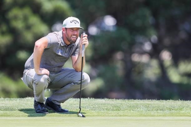 Brad Brunner lines up his putt on the 18th green during the second round of the Wichita Open Benefitting KU Wichita Pediatrics at Crestview Country...