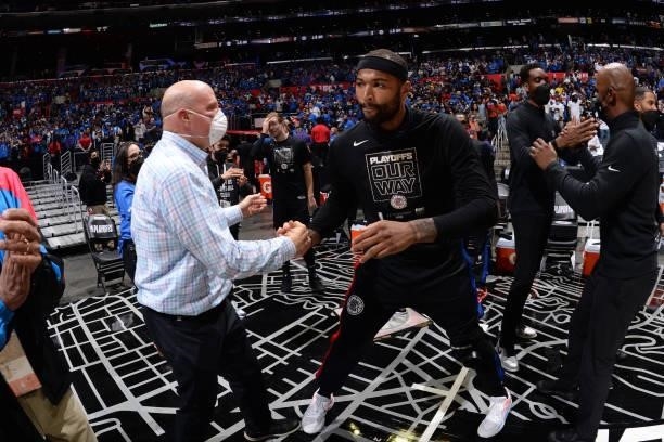 DeMarcus Cousins of the LA Clippers high-fives Owner Steve Ballmer after the game against the Utah Jazz during Round 2, Game 6 of the 2021 NBA...