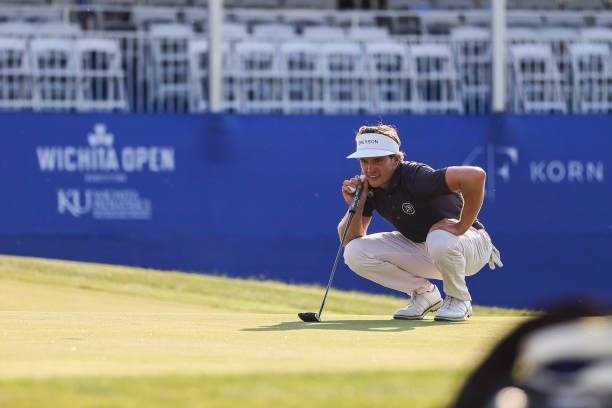 James Nicholas lines up his putt on the 17th green during the second round of the Wichita Open Benefitting KU Wichita Pediatrics at Crestview Country...