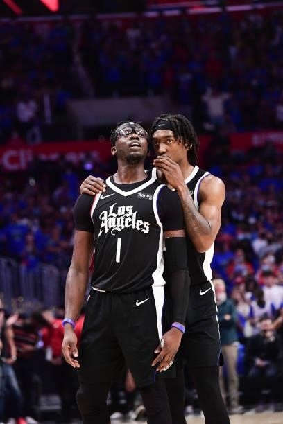 Reggie Jackson of the LA Clippers talks to Terance Mann of the LA Clippers during the game against the Utah Jazz during Round 2, Game 6 of the 2021...