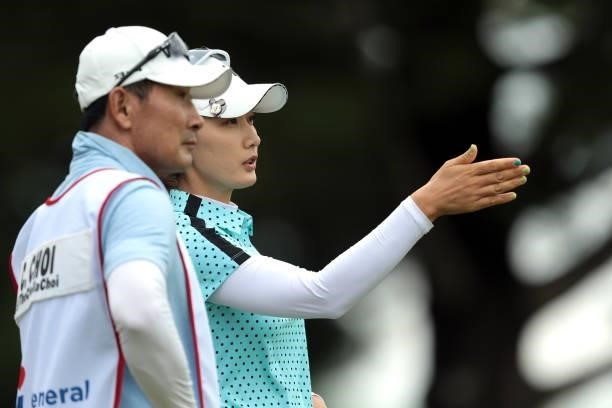 Chella Choi of Korea interacts with her caddy on the 11th hole during the second round of the Meijer LPGA Classic for Simply Give golf tournament at...