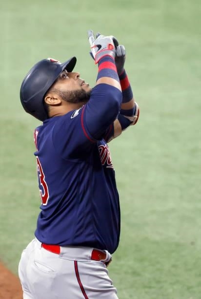 Nelson Cruz of the Minnesota Twins celebrates his two-run home run against the Texas Rangers during the fourth inning at Globe Life Field on June 19,...