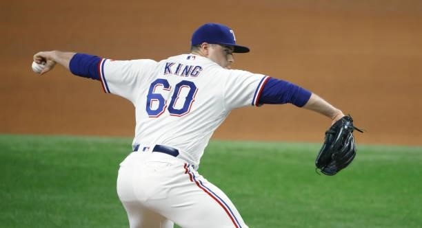 John King of the Texas Rangers pitches against the Minnesota Twins during the seventh inning at Globe Life Field on June 19, 2021 in Arlington, Texas.