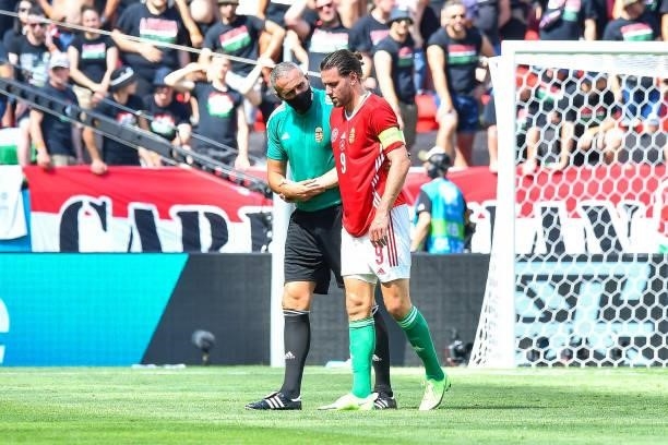 Adam SZALAI of Hungary leaves the pitch injured during the UEFA European Championship football match between Hungary and France at Ferenc Puskas on...