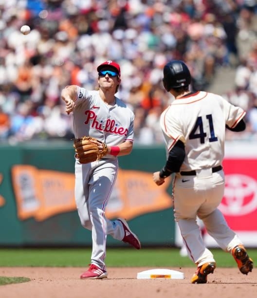 Luke Williams of the Philadelphia Phillies throws to first during the game between the Philadelphia Phillies and the San Francisco Giants at Oracle...