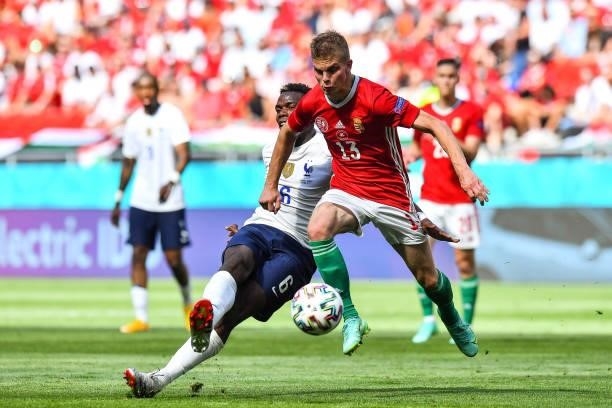Paul POGBA of France and Andras SCHAFER of Hungary during the UEFA European Championship football match between Hungary and France at Ferenc Puskas...