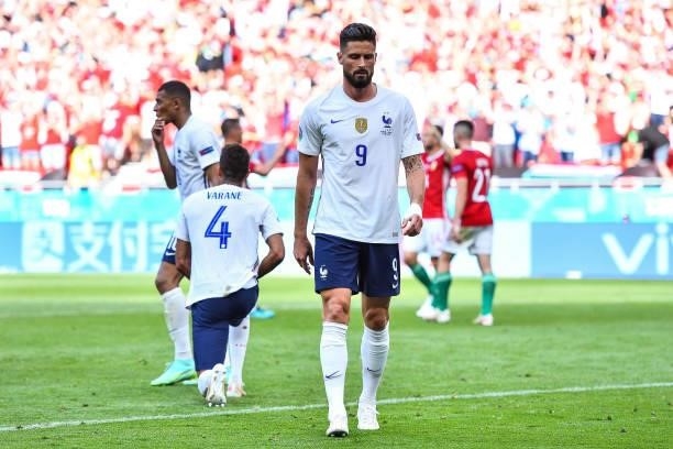 Kylian MBAPPE of France, Raphael VARANE of France and Olivier GIROUD of France are dejected after the UEFA European Championship football match...