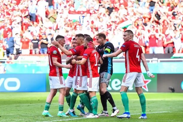 Players of Hungary celebrate after the UEFA European Championship football match between Hungary and France at Ferenc Puskas on June 19, 2021 in...