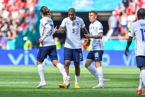 Antoine GRIEZMANN of France celebrates his goal with Presnel KIMPEMBE of France and Lucas DIGNE of France during the UEFA European Championship...