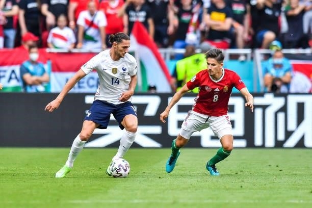 Adrien RABIOT of France and Adam NAGY of Hungary during the UEFA European Championship football match between Hungary and France at Ferenc Puskas on...