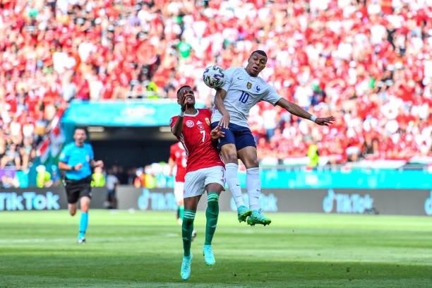 Loic NEGO of Hungary and Kylian MBAPPE of France during the UEFA European Championship football match between Hungary and France at Ferenc Puskas on...
