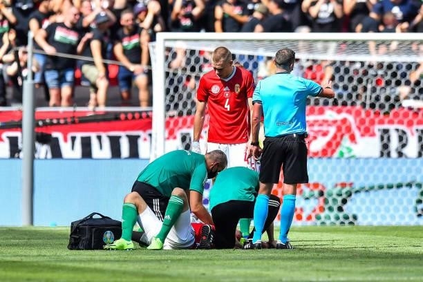 Adam SZALAI of Hungary receives a medical treatment during the UEFA European Championship football match between Hungary and France at Ferenc Puskas...